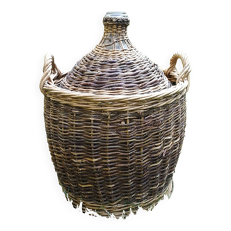 Demijohn with her wicker dressing