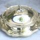 Important vegetable dish covered and its silver-plated metal stand in Louis XV style.