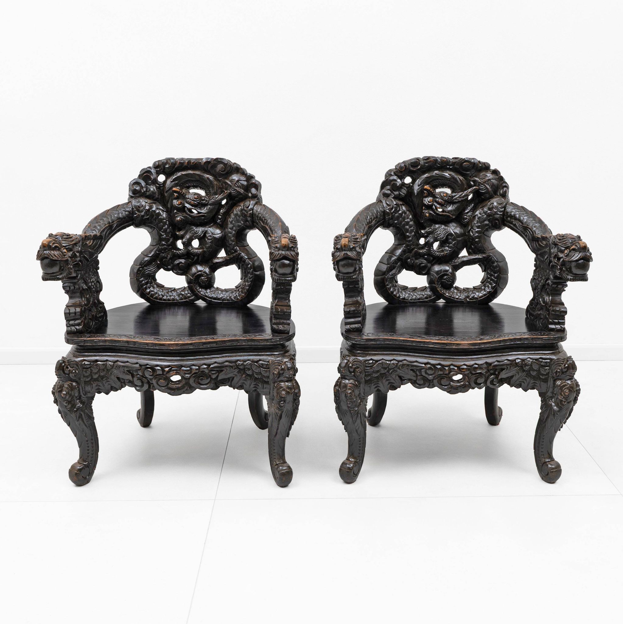 Pair of Chinese Qing Dynasty Carved Dragon Armchairs,Ebonized Hardwood,19th