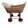 Vintage wicker cradle on wheels from the 1970s.