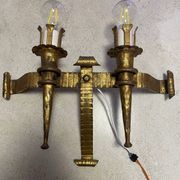 Spanish brutalist wall light in gilded wrought iron.