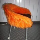 Armchair of child in 1970, metal and orange rug