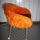 Armchair of child in 1970, metal and orange rug