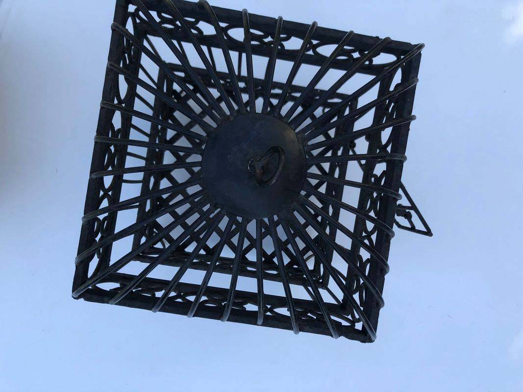 Wrought iron cage