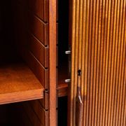 Danish high cabinet in teak with tambour doors Denmark 1960