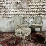 Suite of four cane armchair in gray lacquered wood stamped gouffé louis xv style
