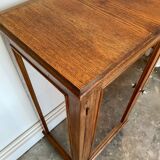 Dark wood display case and transparent glass