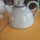 Vintage artisanal style glazed pottery teapot