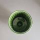 Ceramic flowerpot on stand