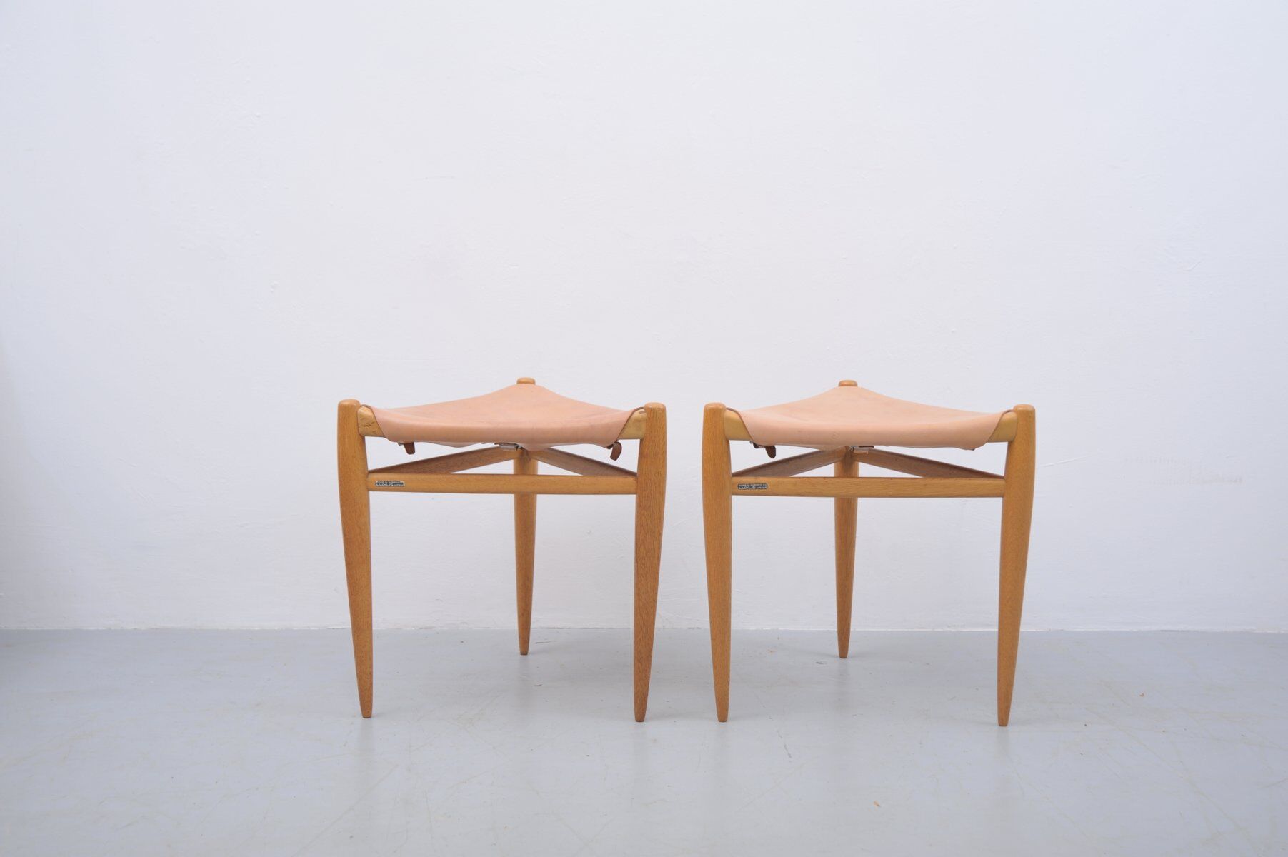 Tripod stools in oak by Uno & Östen Kristiansson for Luxus, 1950s, set of 2
