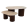 Oval coffee table duo travertine and fluted wooden legs.