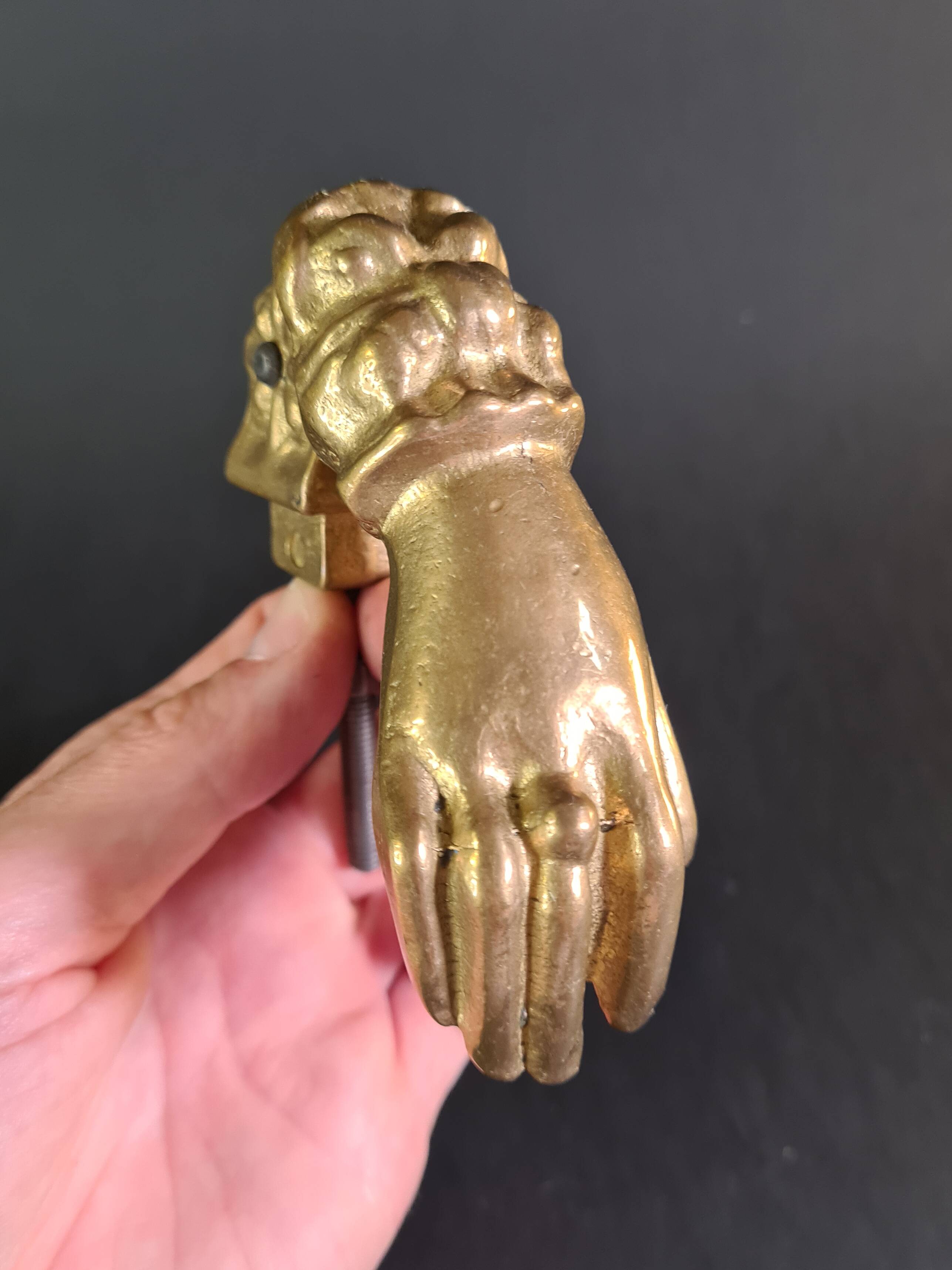 Antique gilt bronze door knocker – Stylized hand