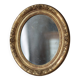 Oval wall mirror with gilded frame and mercury glass. Late 19th-early 20th century.