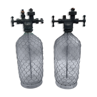 pair of Bottles with Salttz Water Glass and Wire Mesh