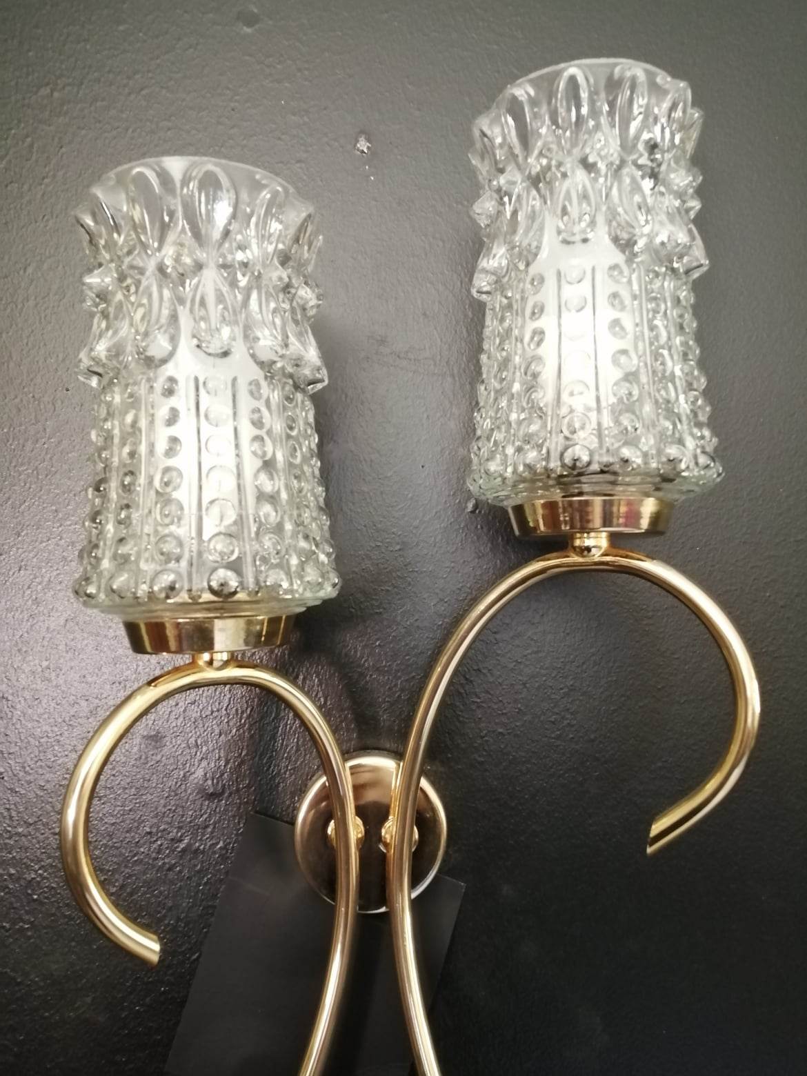 Pair of 50s wall lamps in gold gilded metal
