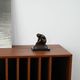 Art Deco female nude figurine – bronze-toned sculpture on geometric base, 1920s/1930s