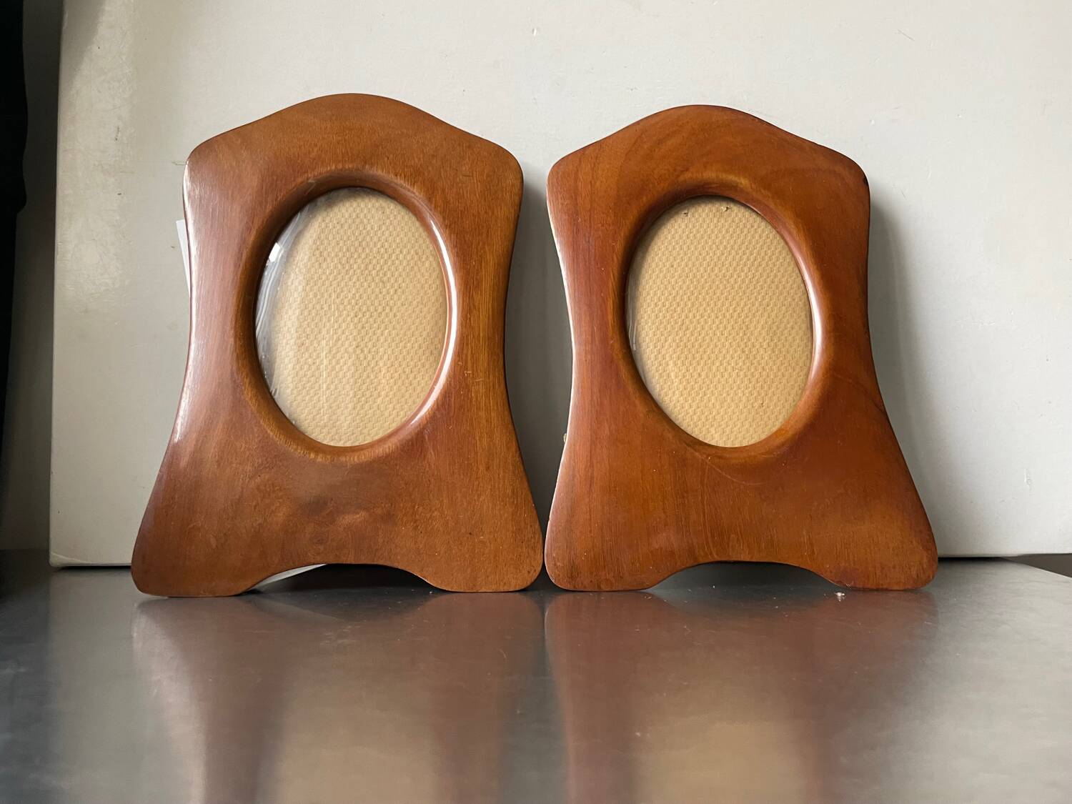 Pair of antique  identical art deco mahogany wooden frames measurements each  25 cm x 17.5 cm  convex glasses