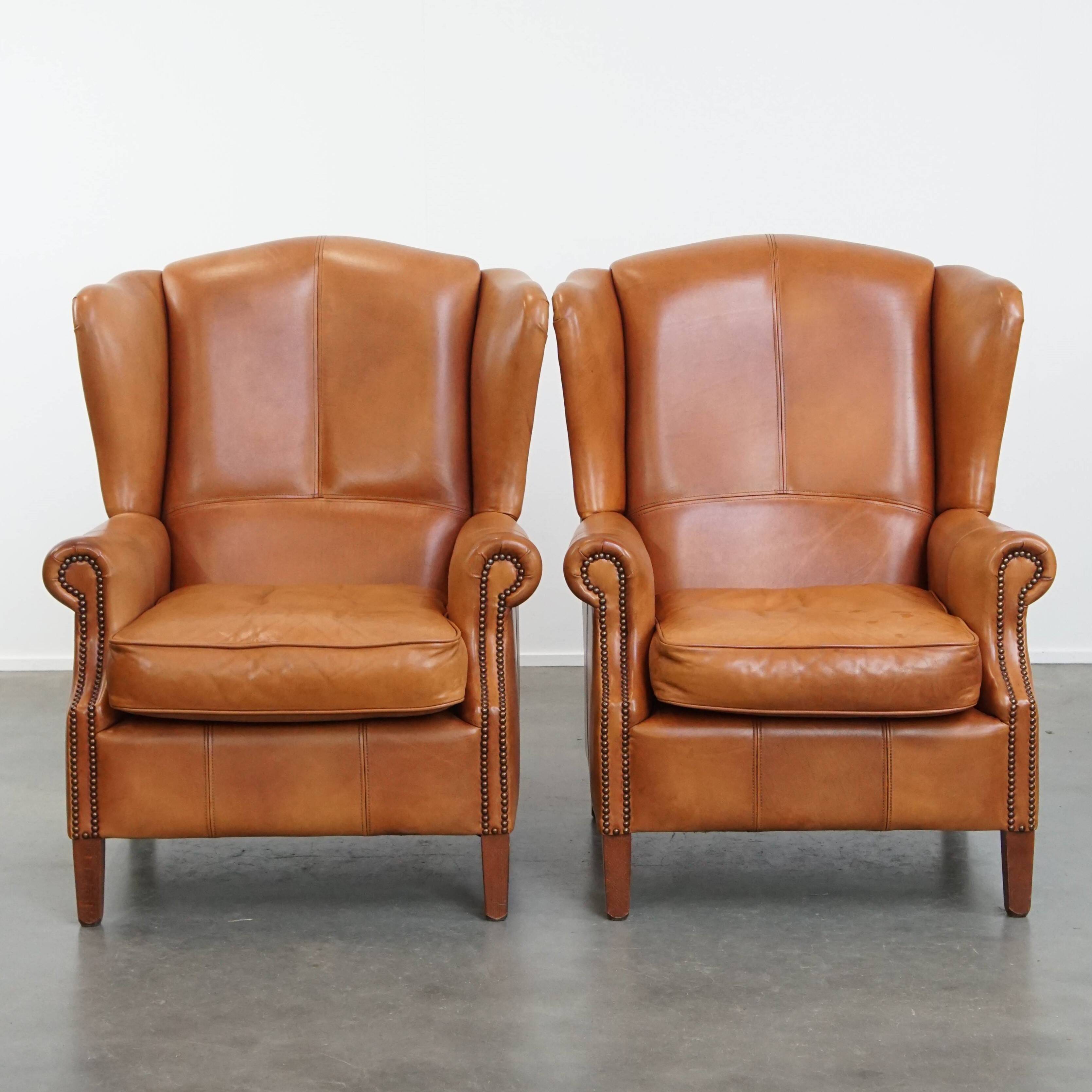 Set of 2 leather wingback chairs