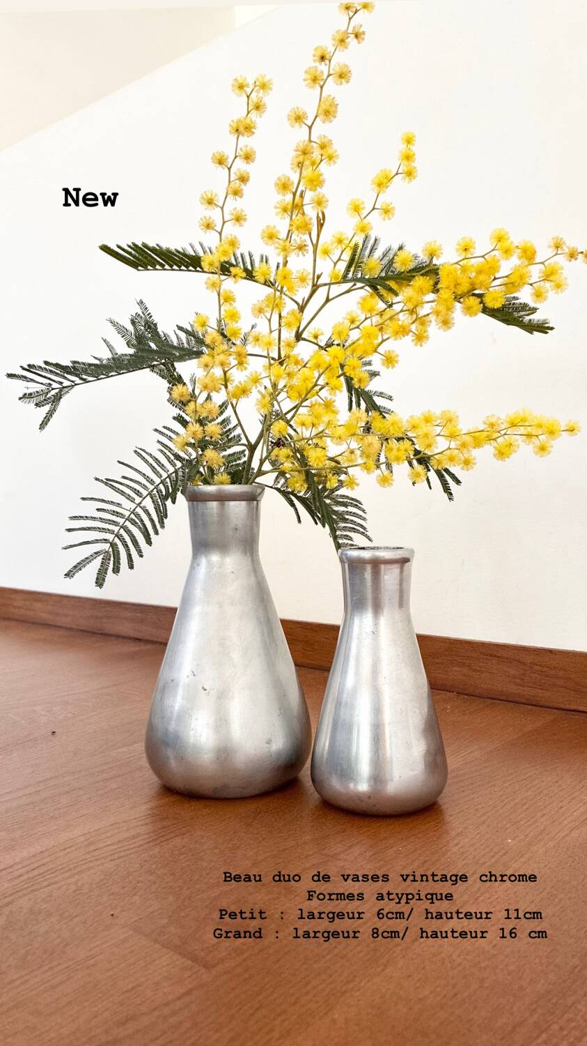Vintage pair of chrome vases from the 1970s.