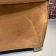 Brown leather armchair