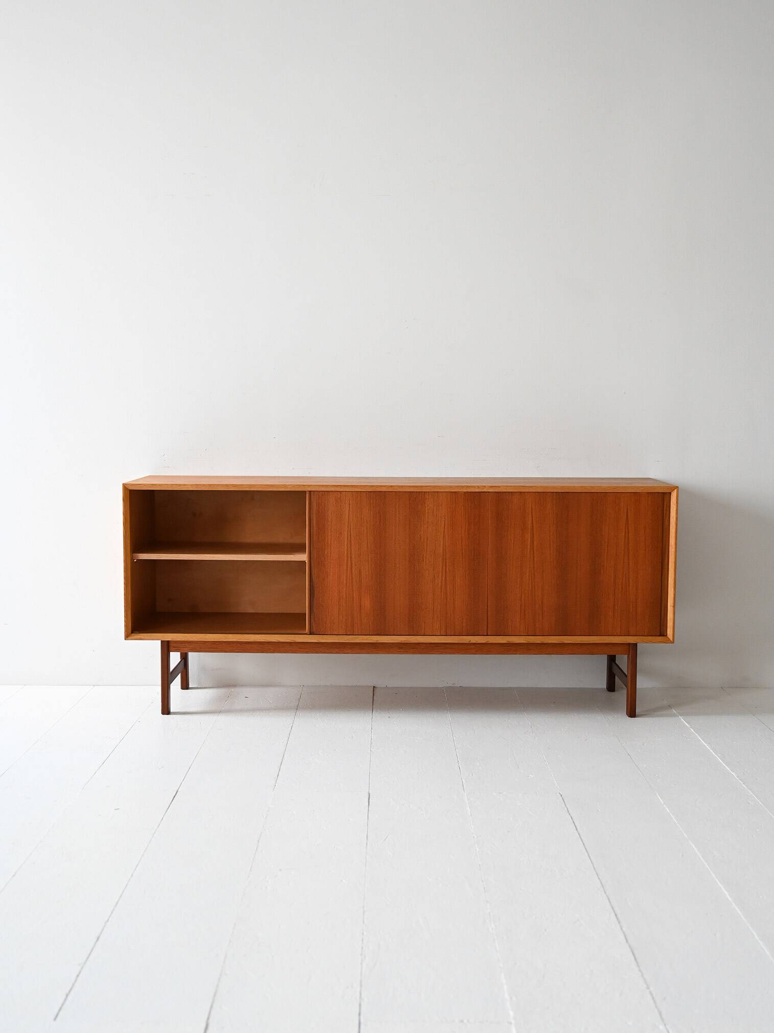 Vintage Scandinavian teak sideboard with metal-lined drawers