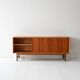 Vintage Scandinavian teak sideboard with metal-lined drawers