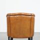 Sheep leather club chair finished with black piping