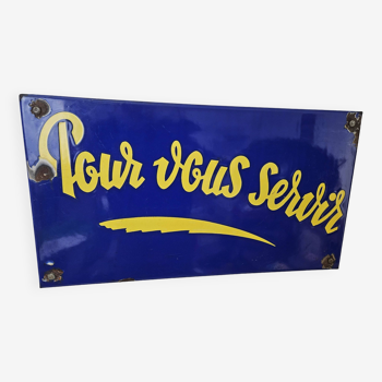 Enameled plaque “To Serve You”