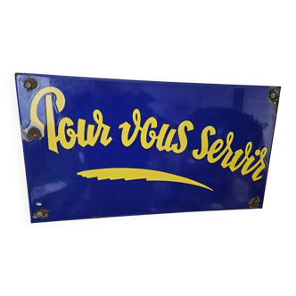 Enameled plaque “To Serve You”