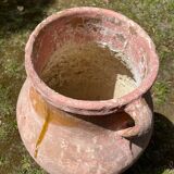 Ancient terracotta pottery jar