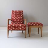Designer armchair and ottoman