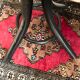 Black rattan parrot coat rack