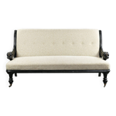 Sofa français du 19ème siècle de style Empire avec accoudoirs détaillés.