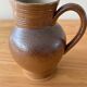 Pitcher in glazed sandstone
