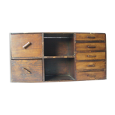 Antique, artisanal seven-drawer furniture