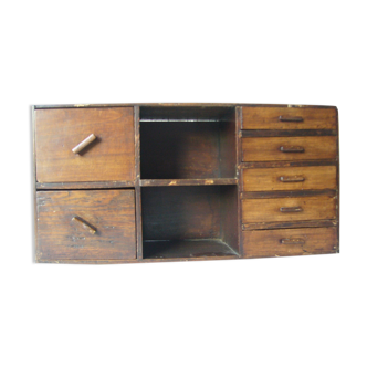 Antique, artisanal seven-drawer furniture