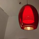 Pair of conical pendant lights in red tinted glass