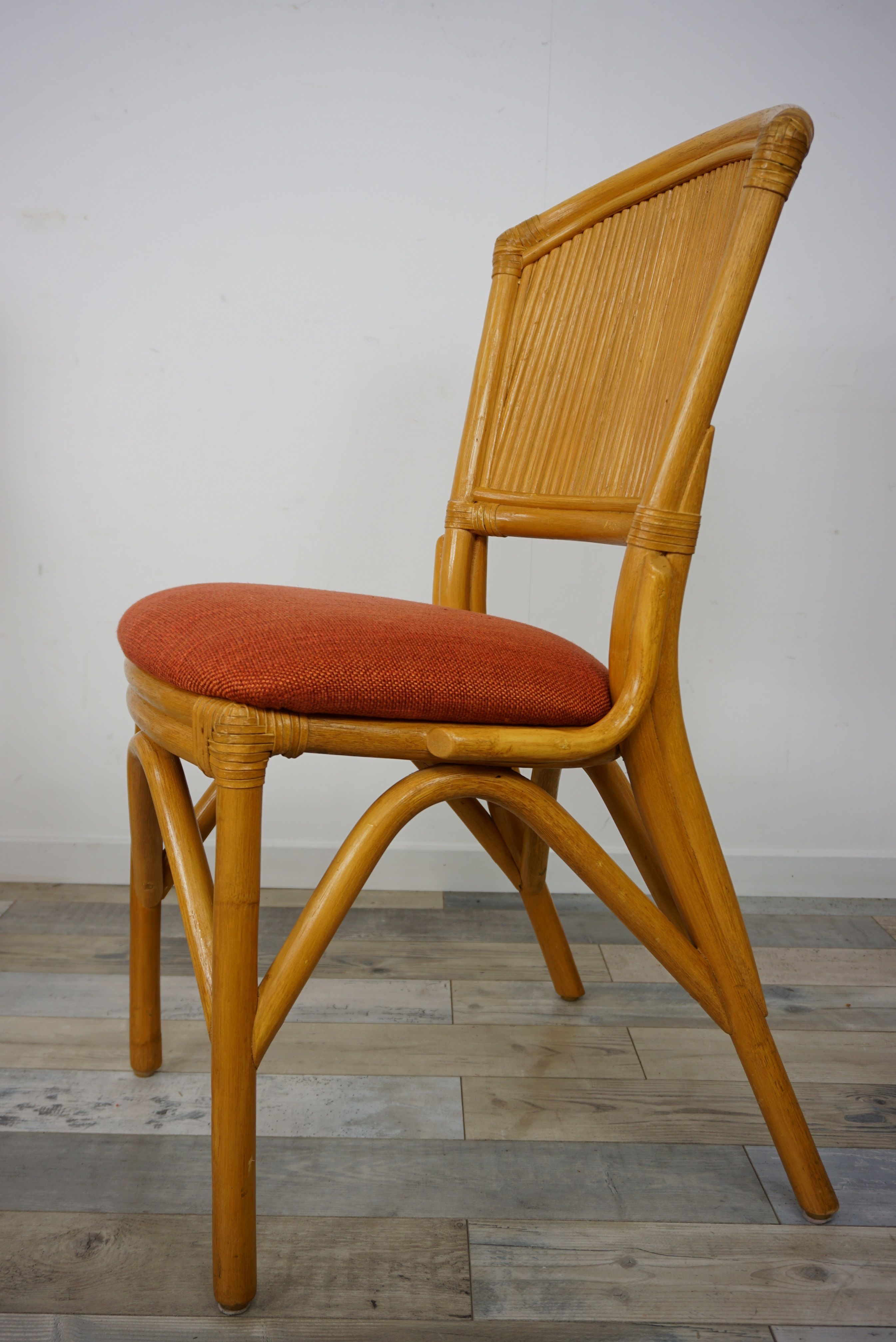 Suite of 4 chairs in Italian rattan design from the 60/70