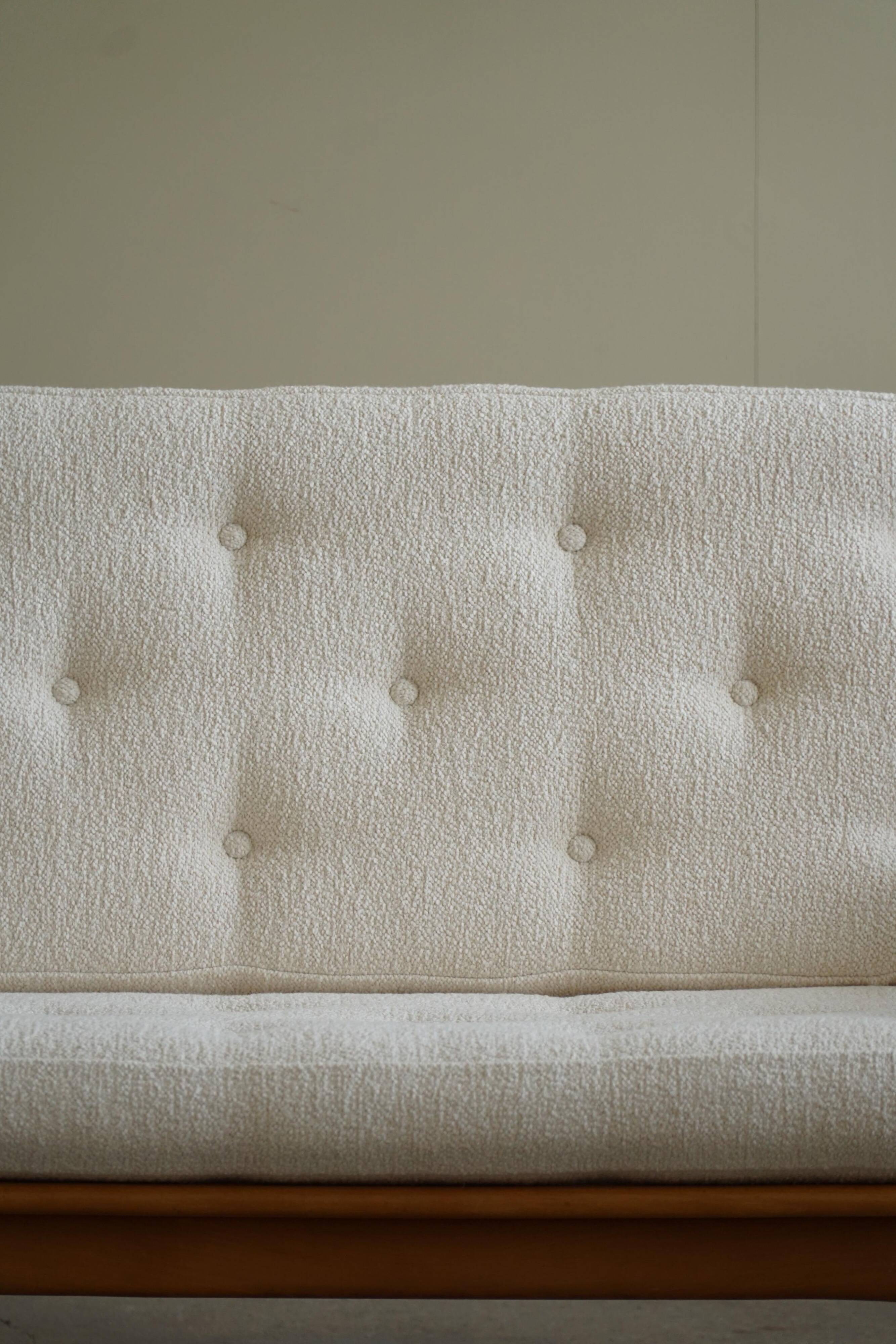 Two-seater canapé Arne Vodder, model Fd 161, reupholstered in boucle, 1950s.