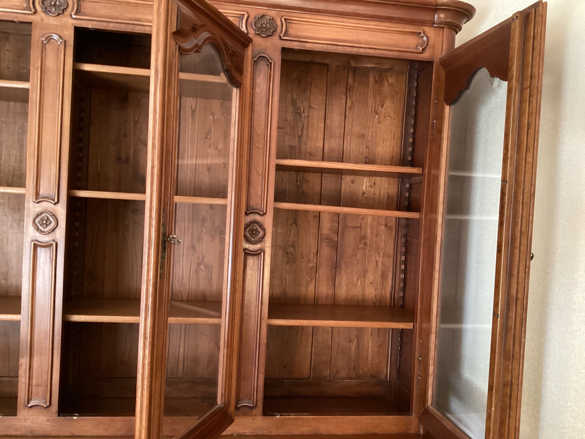 Cherry bookcase stamped Louis Tricoire