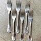 6 Christofle fish forks in silver-plated metal, shell design.