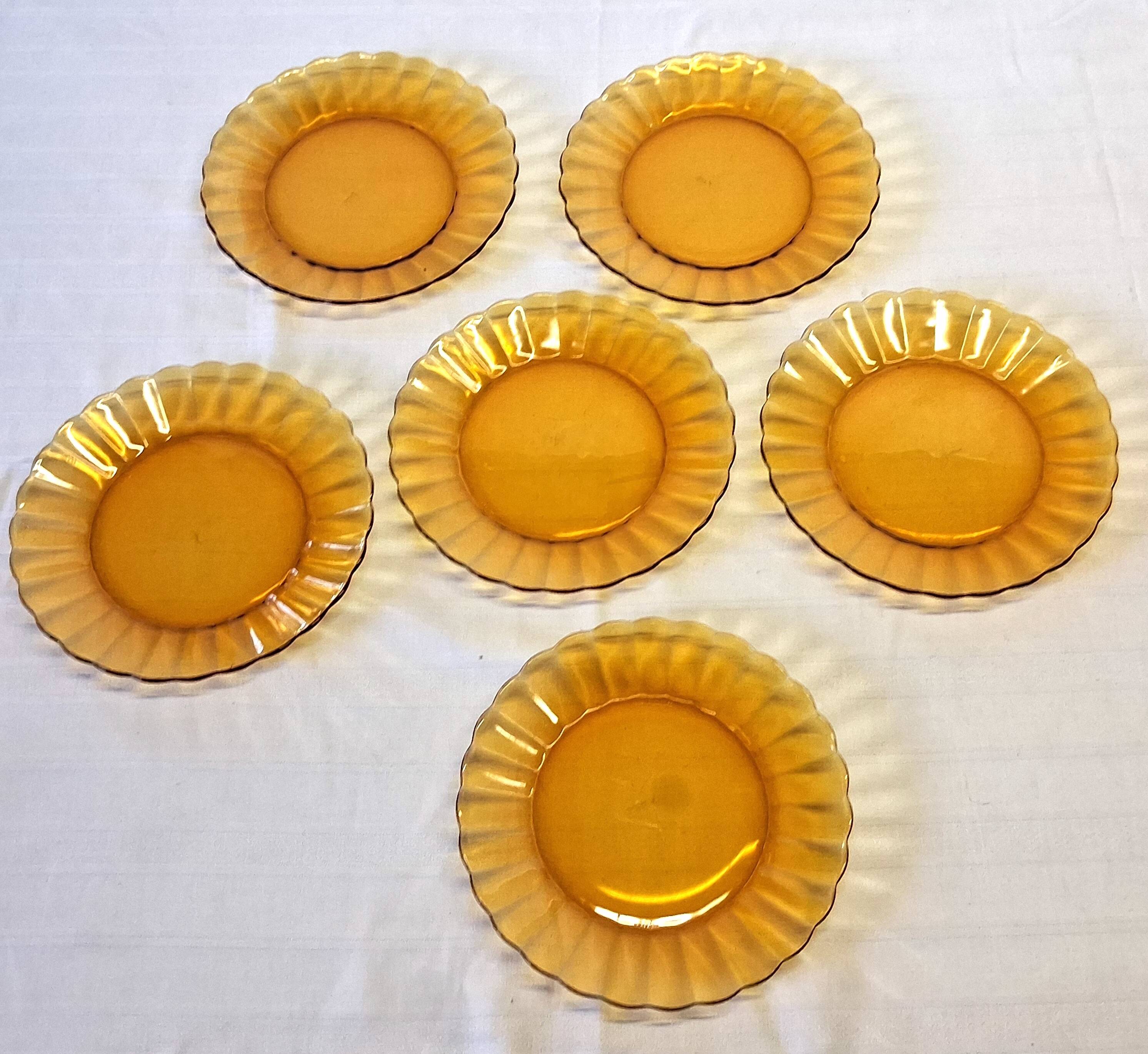 6 Duralex dessert plates in good condition, made of amber-yellow glass