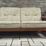 Danish canapé and its 1970s teak armchair