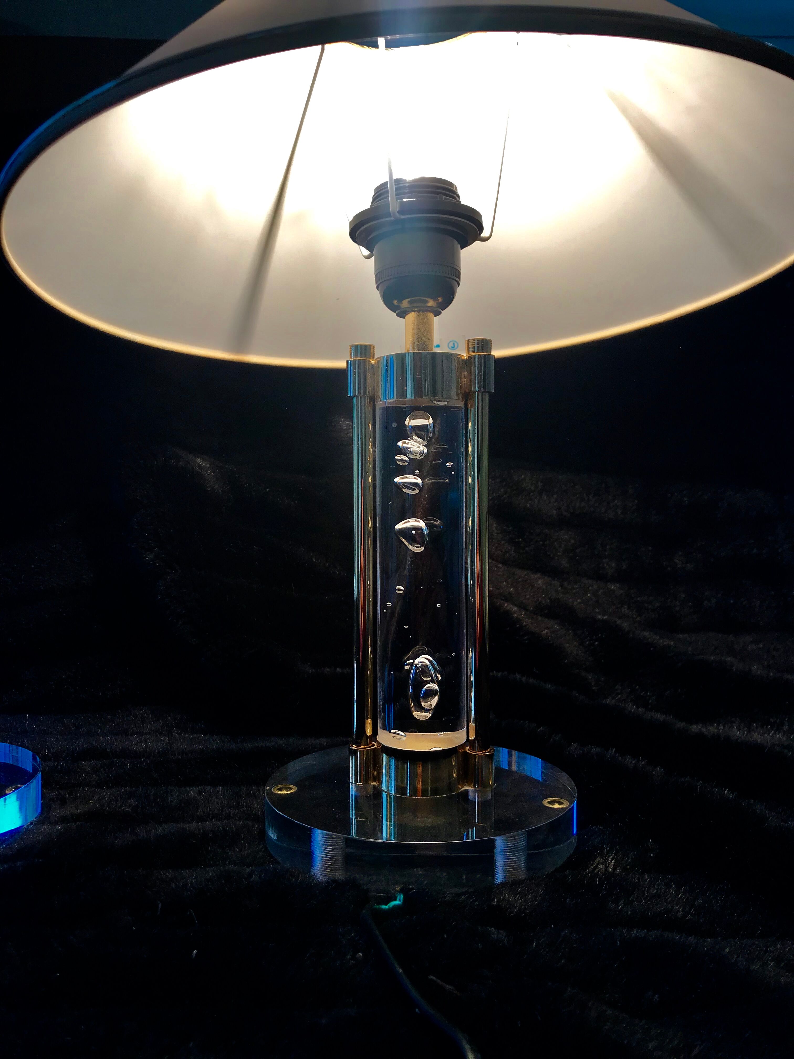 Pair of metacrilic lamps and gold structure