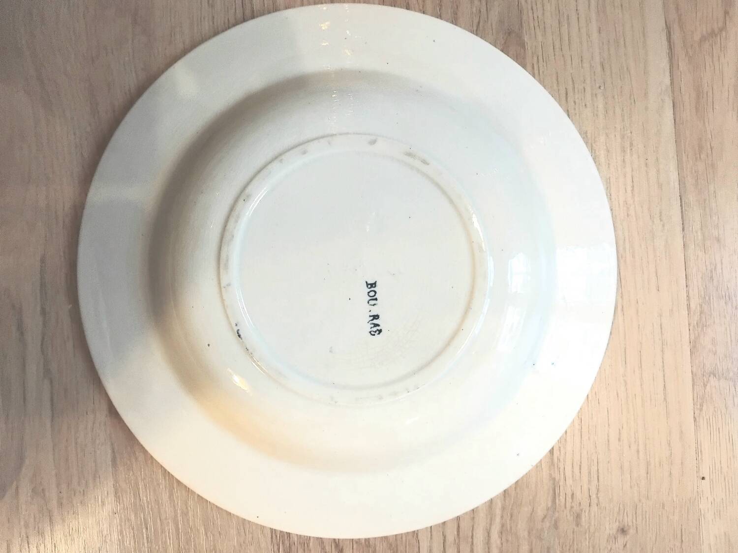 Set of 4 mismatched blue Terre de Fer soup plates