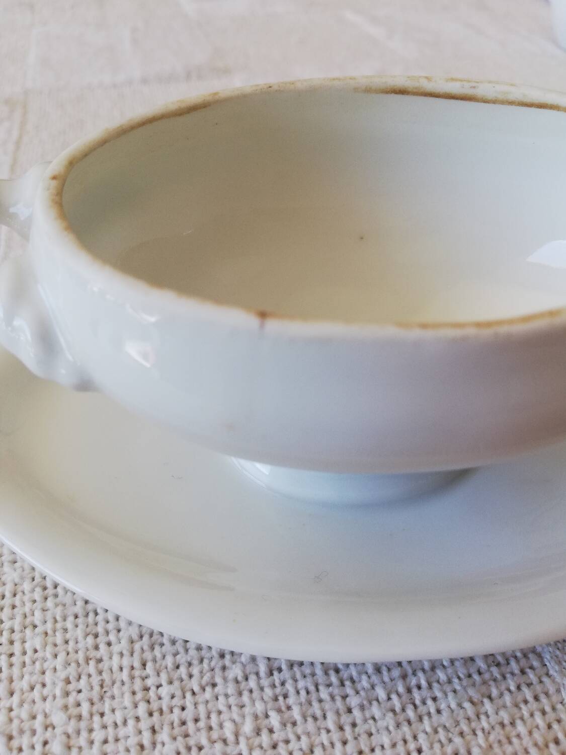 Vintage white earthenware mustard pot or sauce boat.