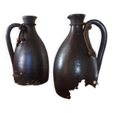 Dark brown stoneware jugs and pitchers with their cord