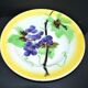 Orchies set of 6 yellow earthenware dessert plates with stencilled fruit decoration.