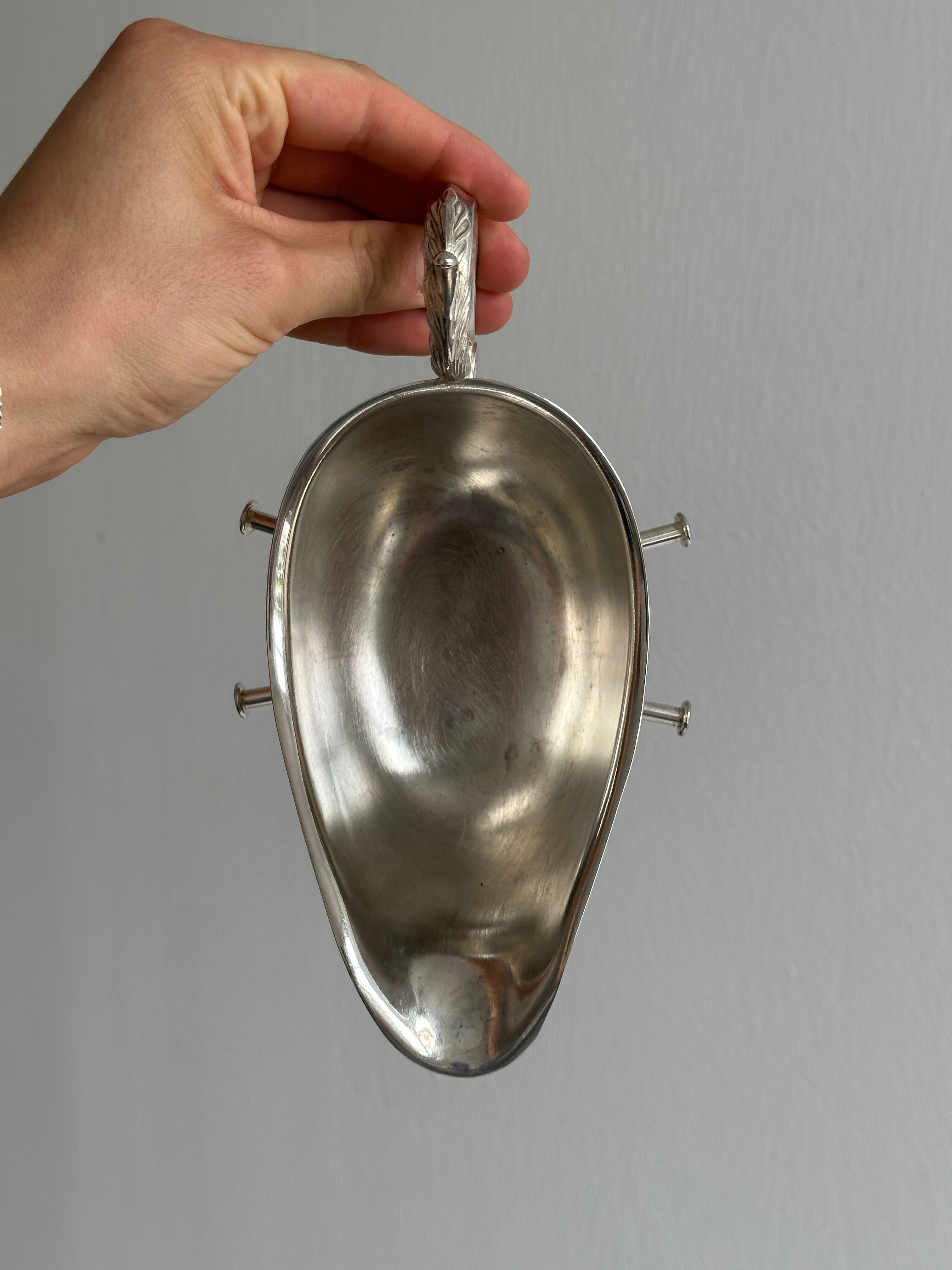 antique metal sauceboat with candle warmer and ladle