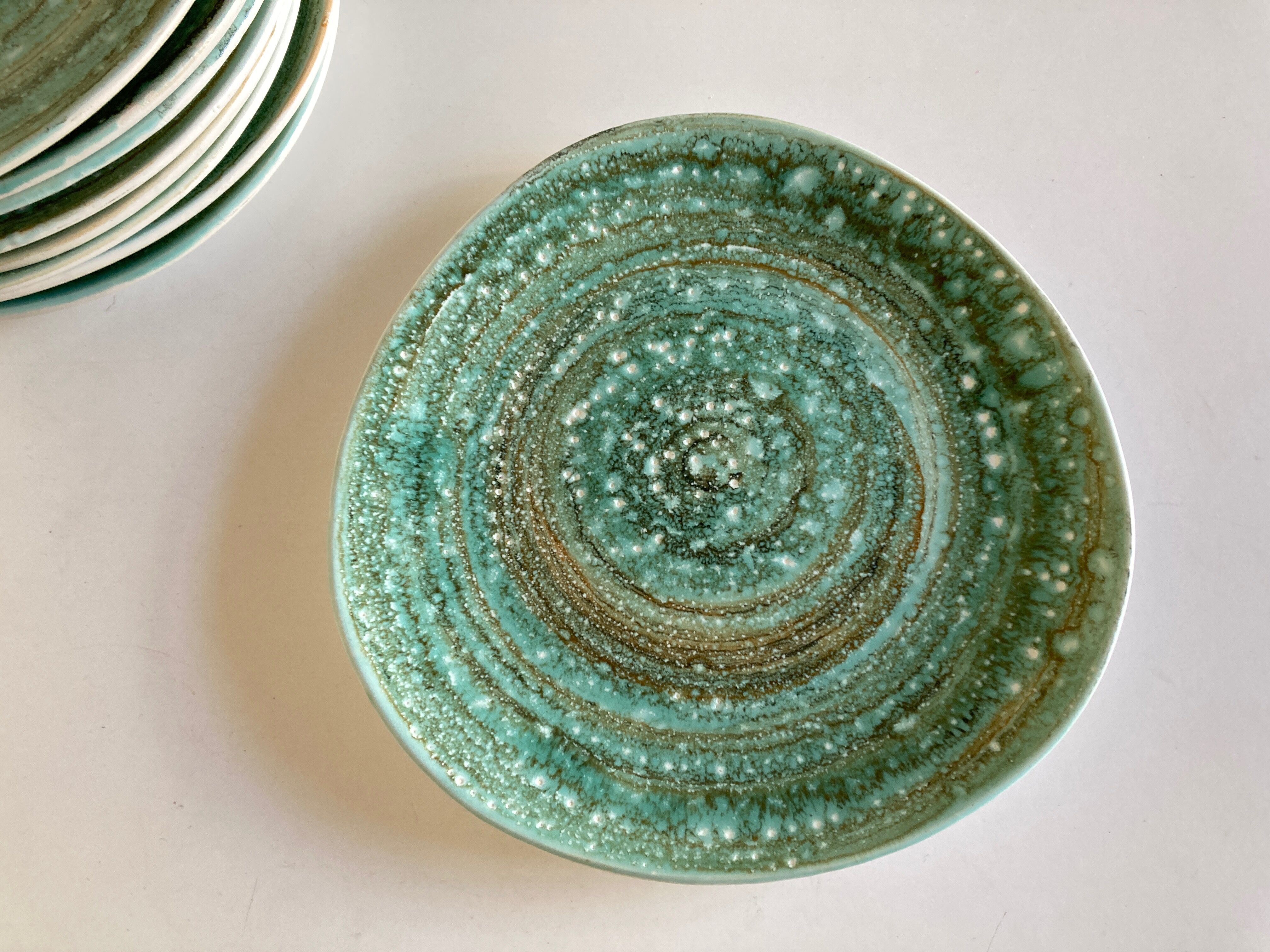 Set of 9 plates 1970 in stoneware Mousse de Nierderviller